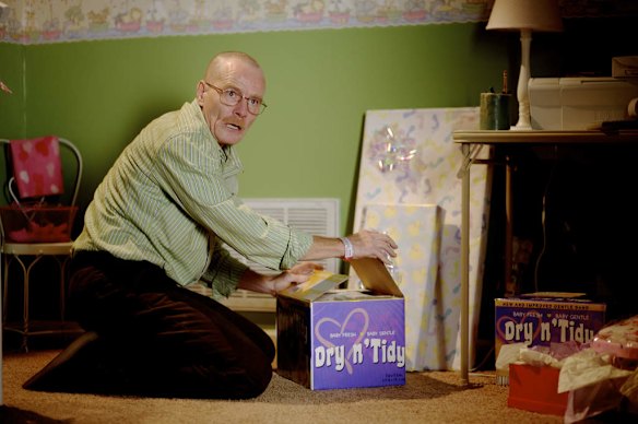 Walter stashing Jesse's gun in a diaper box in Breaking Bad's Bit by a Dead Bee episode, season 2.