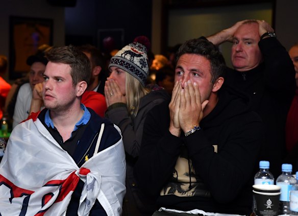 England rugby league player Sam Burgess watches the FIFA World Cup semi-final between Croatia and England in Coogee, Sydney.