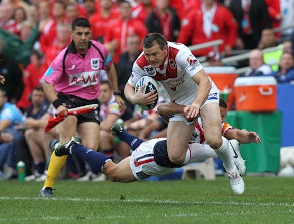 The Dragons Brett Morris up the wing during the first half.