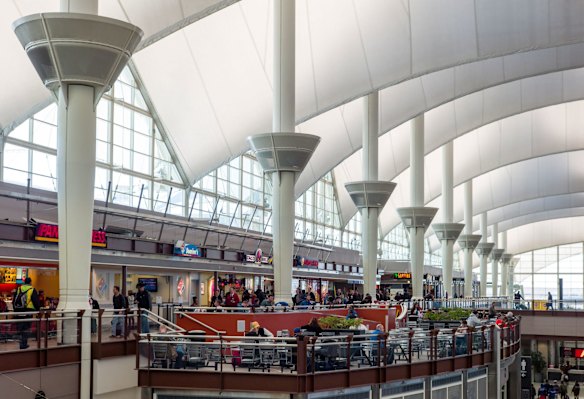 JEPPESEN TERMINAL, DENVER: Denver airport's Jeppesen Terminal features pitched roofs that recall the peaks of the surrounding Rocky Mountains, or perhaps early settler wagons or native tepees – and they certainly prove airports don't have to be boring. The tent-like roofs are made from wafer-thin fibreglass coated with Teflon, thin enough to let in light. The terminal is often cited as having one of the best architectural designs of any American building.