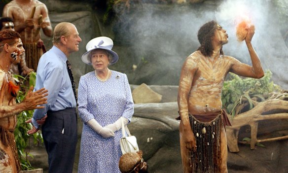 Britain's Queen Elizabeth II and the Duke of Edinburgh watching a culture show at Tjapukai Aboriginal Culture Park in Cairns, Australia. 