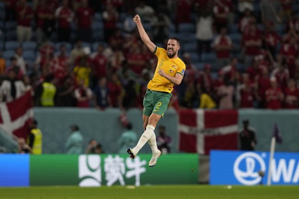 Australia's Milos Degenek celebrates the win.