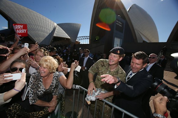 Prince Harry and the Premier, Mike Baird, greet crowds at the Opera House