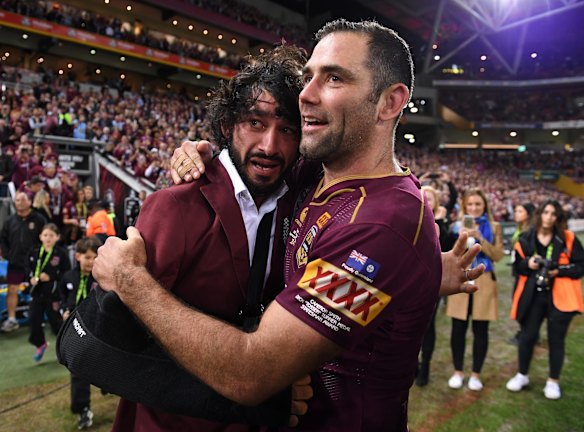 Brothers-in-arms: Johnathan Thurston will do the honours for old mate Cameron Smith.