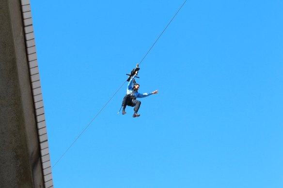 Actor Hugh Jackman on a flying fox during filming for The Oprah Winfrey Show in 2010.