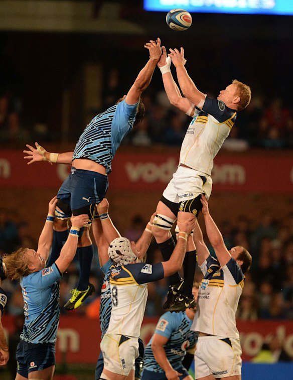 Peter Kimlin of the Brumbies goes up for line-out ball.