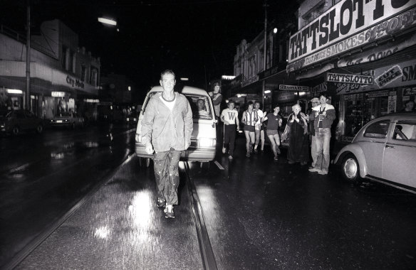 Cliff Young running towards Donaster Shopping Town during the final stages of the Westfield Sydney to Melbourne ultra-marathon, May 2, 1983.