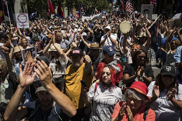 Protesters attend the Melbourne Freedom rally in the CBD
