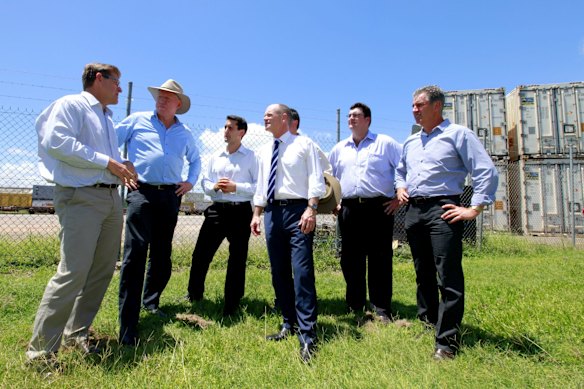 Premier Campbell Newman and his LNP colleagues visit a railway yard in Townsville to speak about Townsville's Super Stadium project.