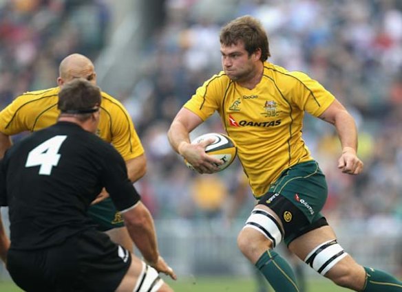 Ben McCalman runs the ball.