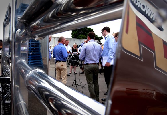 Premier Campbell Newman speaking to journalists at the Emerald Carrying Company.