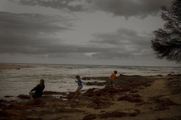 Kids playing at Betka Beach, Mallacoota.