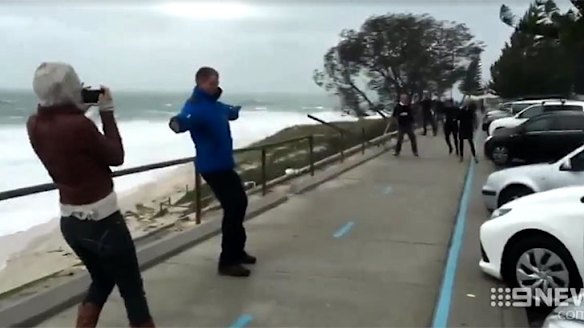 The wind was so strong, people were able to leab agains the 110km/h wind gusts.