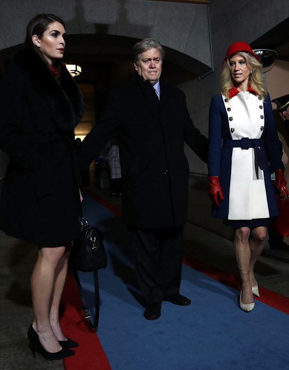 An appropriately dressed Hope Hicks, incoming White House Director of Strategic Communications, Steve Bannon, chief strategist Trump, and Kellyanne Conway, a senior Trump adviser who appears to have confused the inauguration with a Paddington Bear fan club meeting. 