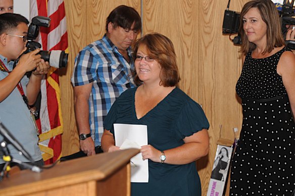 Tina Dugard (centre),aunt of the released kidnapped victim Jaycee Dugard and a Dugard family spokesperson, arrives to read a statement from the family at a news conference at the Federal Building in Los Angeles on September 3.