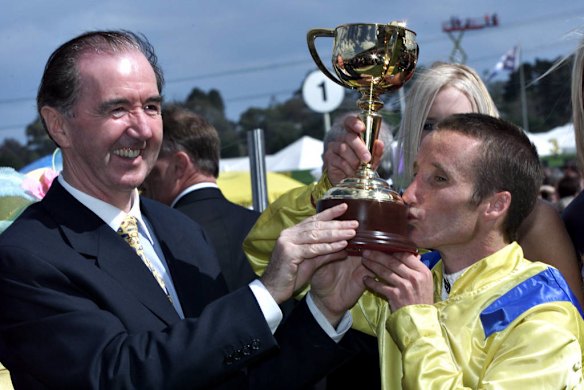 Trainer Dermot Weld and Damien Oliver with the 2002 Melbourne Cup.