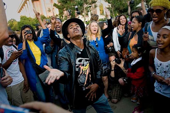 Marlon Russ mourns Michael Jackson by dancing and singing outside the UCLA medical Center.