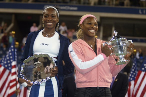 2002 US Open - Venus Williams (L) and Serena Williams after the women's final of the US Open. Serena Williams defeated her sister and won.