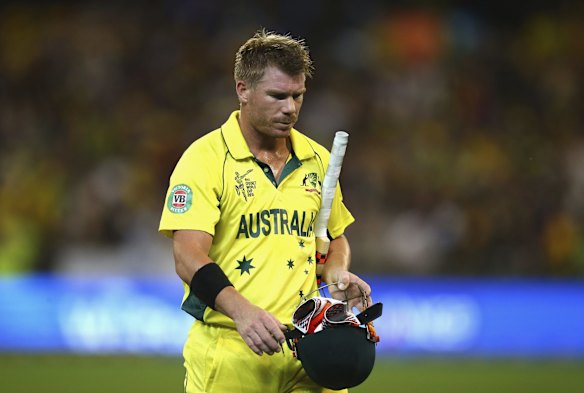 A downcast David Warner leaves after being dismissed by Matt Henry.