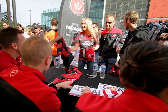 Western Sydney Wanderers fans get autographs from players at the Grand Final Saturday at Suncorp Stadium, Brisbane ahead of the A-League 2014 Grand Final.