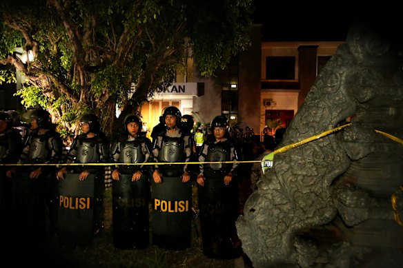 Indonesian riot squad police guard the enterance to Kerobokan prison prior to the transfer of Bali Nine duo Andrew Chan and Myuran Sukumaran.