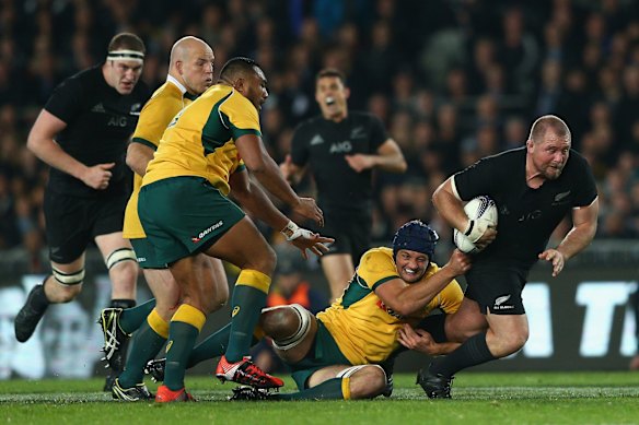 Tony Woodcock is dragged down.