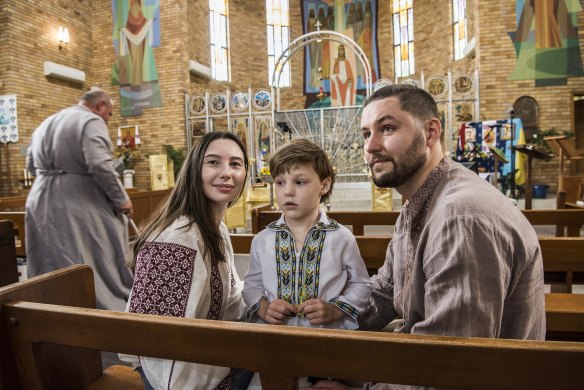 Orysia Melnyk and Oleg Sapishchuk pictured with four-year-old son Danylo at St Andrew’s Ukrainian Catholic Church in Lidcombe.
