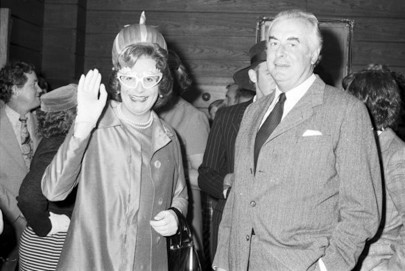 Ex Prime Minister Gough Whitlam stars as himself in a scene being shot at Sydney Airport for the next Barry McKenzie film "Bazza Holds His Own" on 20 April 1974. He is pictured with Barry Humphries playing Auntie Edna.