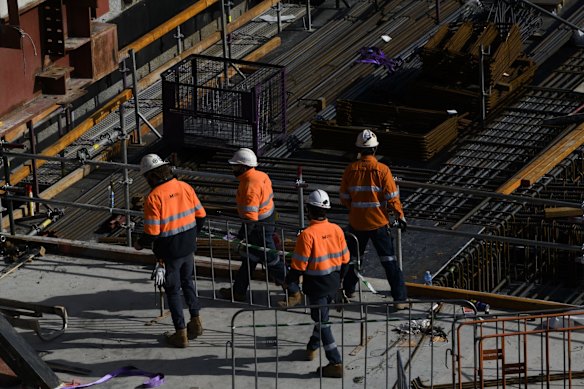 Workers at Barangaroo - from 12:01am on Monday, all construction work will be paused to stop the spread of COVID-19. July 17, 2021.