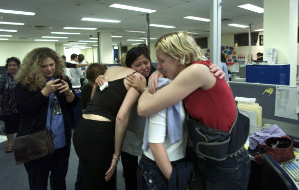 Distraught Ansett staff pack their belongings at the Ansett Oxford Square offices on September 14, 2001