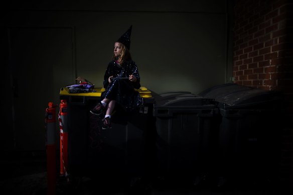 8-year-old Maisy waits patiently to snap up free tickets to the final stage show dress rehearsals of Harry Potter and the Cursed Child. 