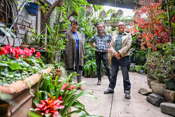 Helen Marcou AM, Quincy McLean AM and Jo Franklin in the courtyard