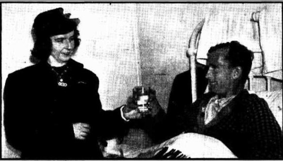 ‘Max Thomas in Yaralla Military Hospital, being handed a glass of water by his wife.’ The Sun, July 20, 1941
