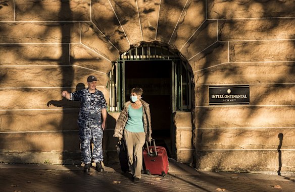 People are released from isolation at the Sydney Intercontinental Hotel.
