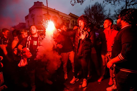 Italian soccer fans celebrate in Lygon Street, Carlton, after Italy won the Euro 2020 final against England at Wembley Stadium in London. 