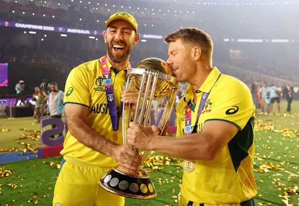 Happy days: World Cup winners Glenn Maxwell and David Warner in 2023.