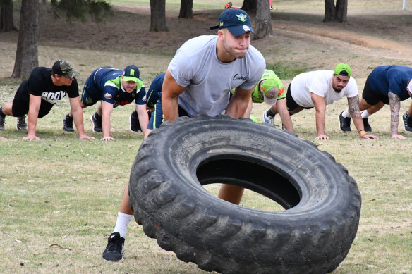 Nick Cotric flipping tyres.