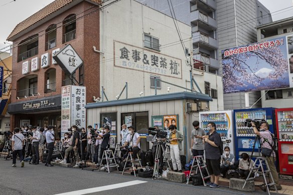 Members of media gather in front of Nara Medical University Hospital, awaiting the news of Shinzo Abe's condition. 