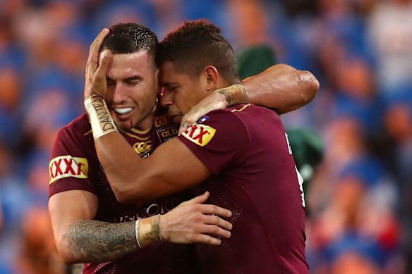Darius Boyd of the Maroons celebrates with try scorer Dane Gagai of the Maroons.