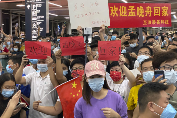 Supporters of Huawei CFO Meng Wanzhou gather at Shenzhen Bao’an International Airport in Shenzhen in southern China’s Guangdong Province.
