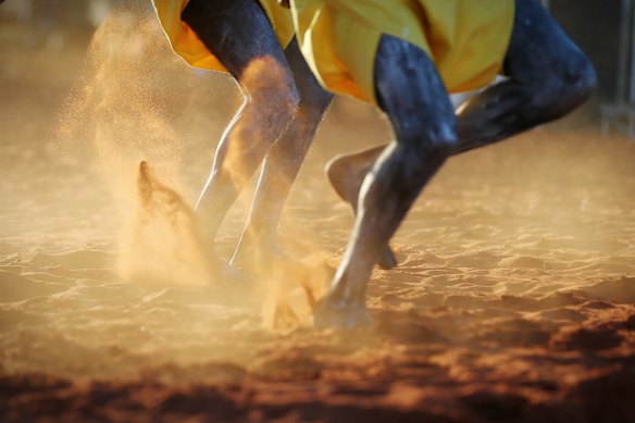 Gumatj clan ceremonial leaders performing the Gurtha ceremony at the opening ceremony of the First Nations National Convention held in Uluru.