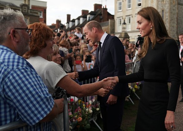 Catherine, Princess of Wales, and Prince William, Prince of Wales, meet members of the public at Windsor Castle.