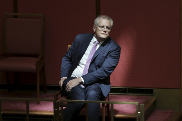 Scott Morrison, watching Mathias Cormann deliver his last address in the Senate, says the government's tax cuts will help support the economy.