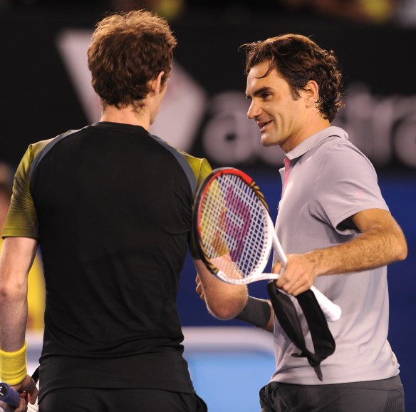 Andy Murray and Roger Federer share a moment at the 2013 Open.