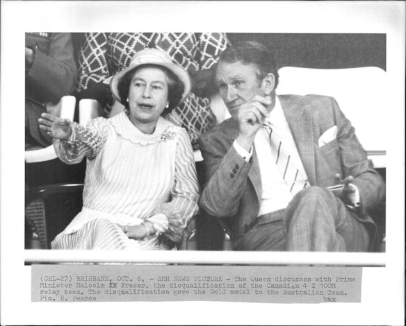 The Queen discusses with then-prime minister Malcolm Fraser the disqualification of the Canadian 4 X 100 metre relay team. The disqualification gave the gold medal to the Australian Team on October 18, 1982.