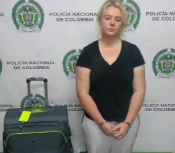 Cassandra Sainsbury was photographed beside her luggage.