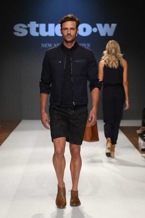 A model showcases an all-black design by Studio.W.