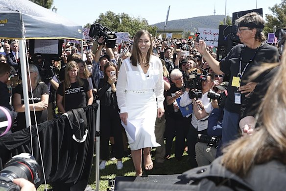 Brittany Higgins takes the stage at the Women's March 4 Justice at Parliament House in Canberra today.