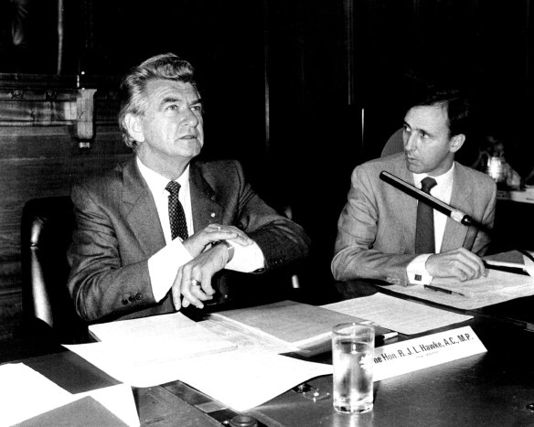  The Prime Minster, Mr. Hawke, and the Treasurer, Mr. Keating, consider the time at summit in Canberra. 
