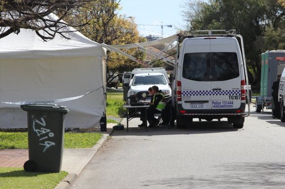 A police forensic tent set up in the driveway of the Carlisle property on Wednesday.